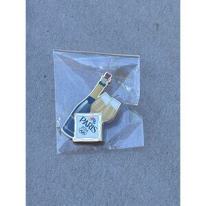 NBC Consignment Olympics Paris 2024 Champagne Lapel pin